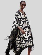 KAFTAN AMPLIO CON BORDE DE FLECOS