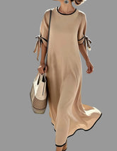 VESTIDO AMPLIO CON LAZOS EN LAS MANGAS