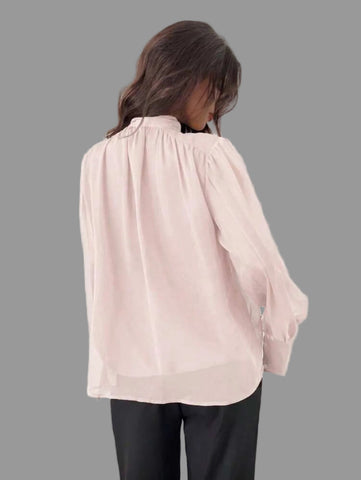 CAMISA AMPLIA CON ESCOTE Y LAZADA 9 CLRS