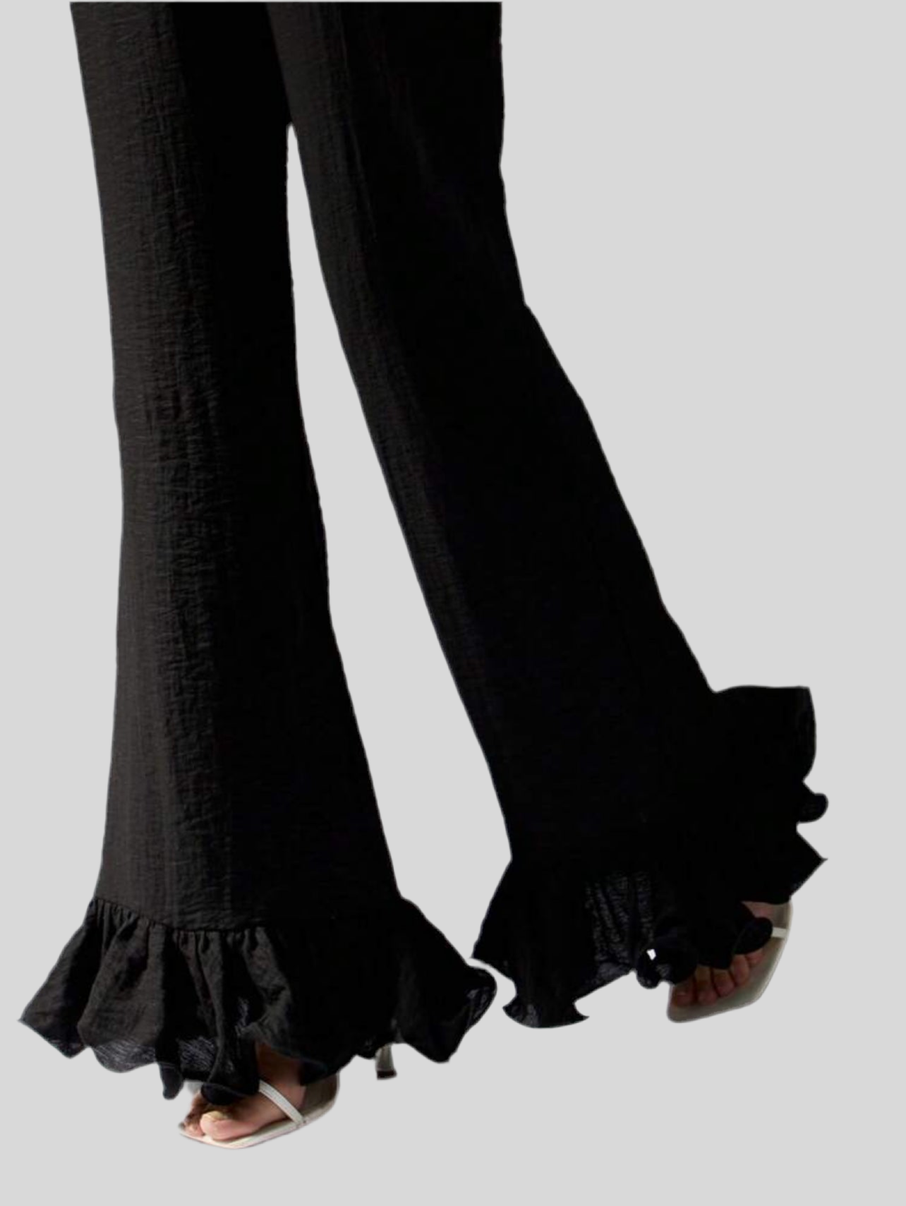 PANTALÓN CON VOLANTE RIZADO