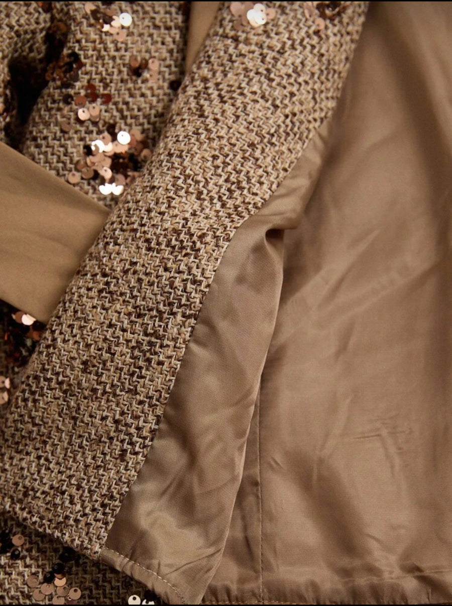 CHAQUETA CORTA CON LENTEJUELAS Y LAZO