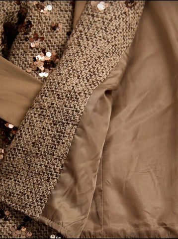 CHAQUETA CORTA CON LENTEJUELAS Y LAZO