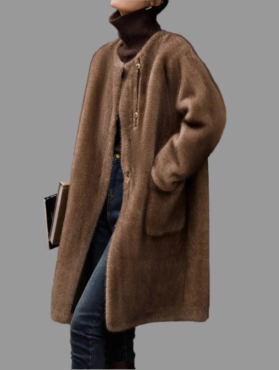 ABRIGO DE ECO PIEL DE VISÓN CON BOLSILLOS PLASTON