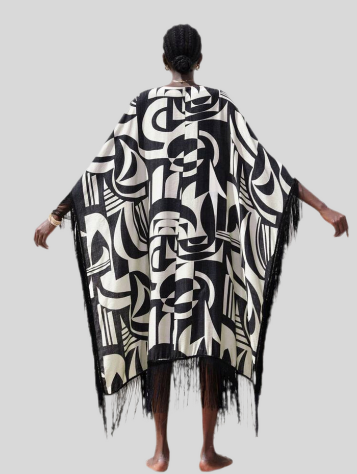 KAFTAN AMPLIO CON BORDE DE FLECOS