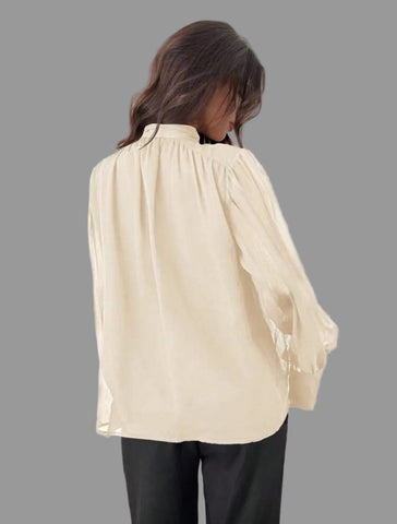 CAMISA AMPLIA CON ESCOTE Y LAZADA 9 CLRS