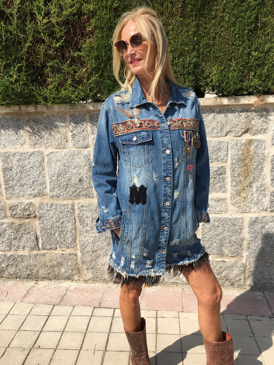 Denim jacket with charms and sequins