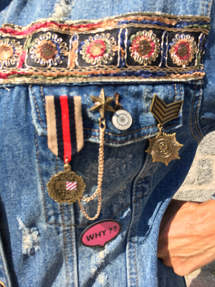 Denim jacket with charms and sequins