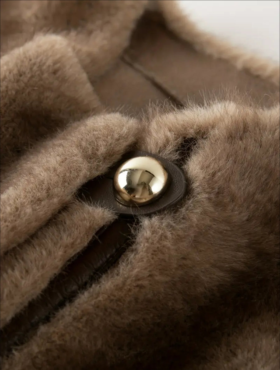 ABRIGO DE ECO PIEL DE VISÓN CON BOLSILLOS PLASTON