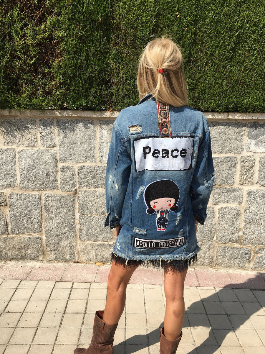 Denim jacket with charms and sequins