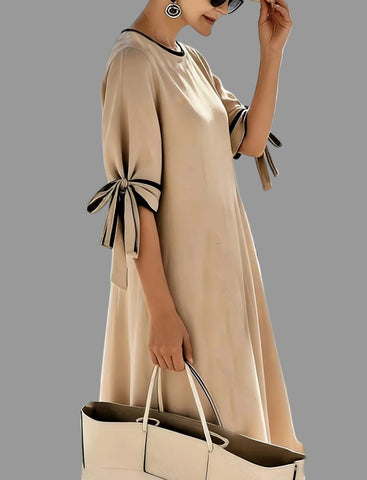 VESTIDO AMPLIO CON LAZOS EN LAS MANGAS