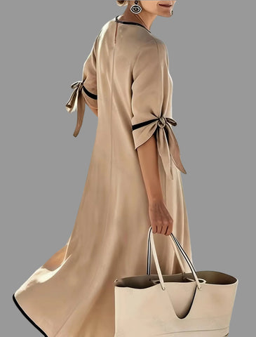 VESTIDO AMPLIO CON LAZOS EN LAS MANGAS