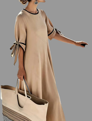 VESTIDO AMPLIO CON LAZOS EN LAS MANGAS