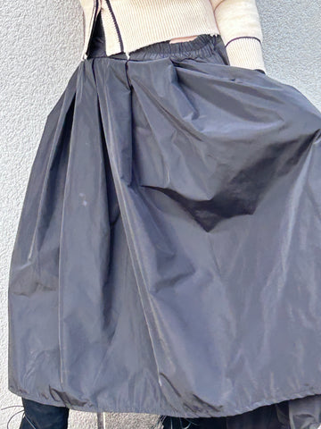 Falda polisón de nylón con bolsillos laterales