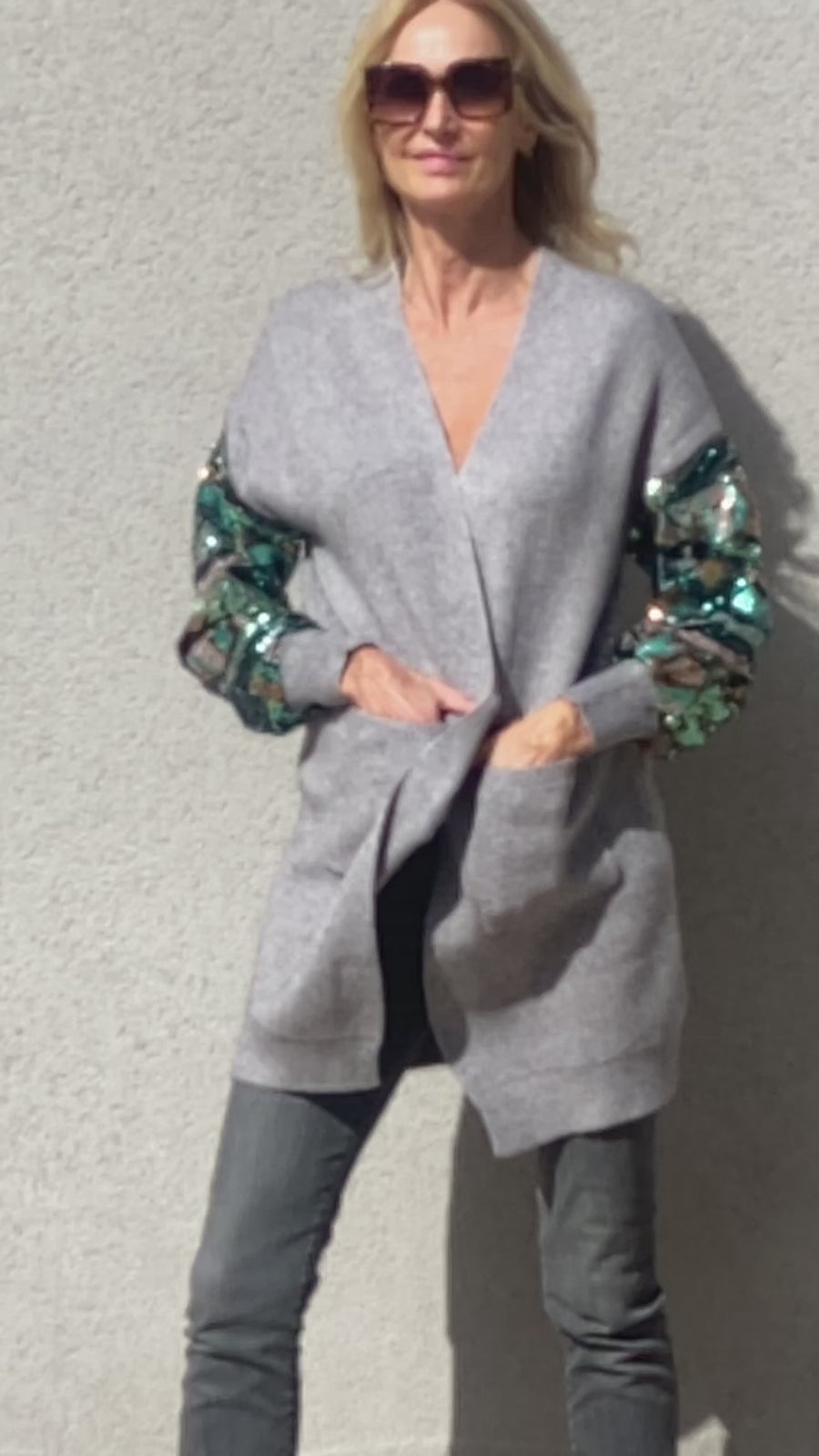 Knitted cardigan with sequin sleeves