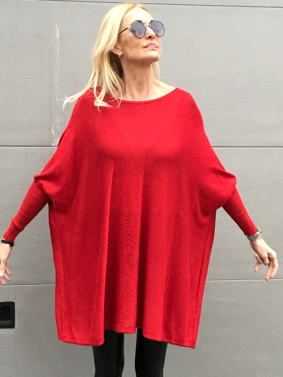 Oversize round neckline and glitter jumper